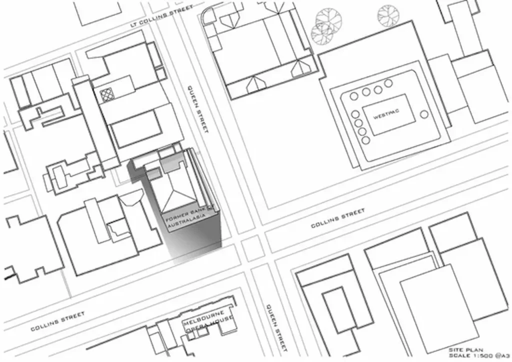 Simple site plan showing building layout, streets, and surrounding structures for development planning