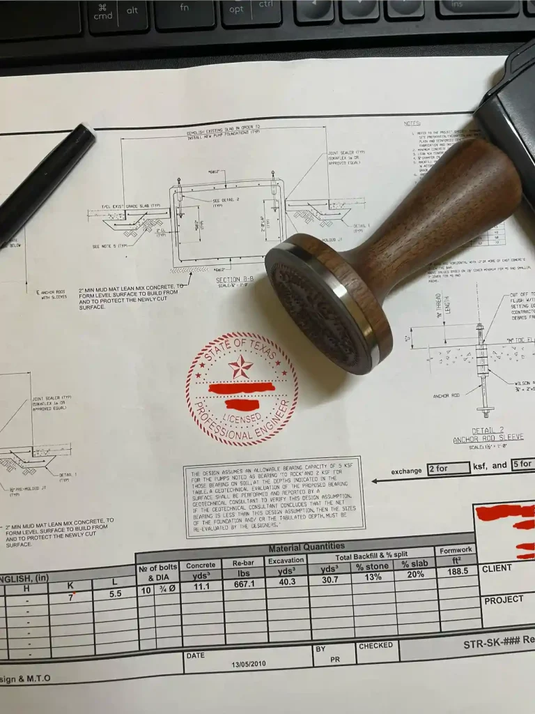 PE stamp and wooden seal on Texas engineering plans, confirming licensed professional engineer approval.
